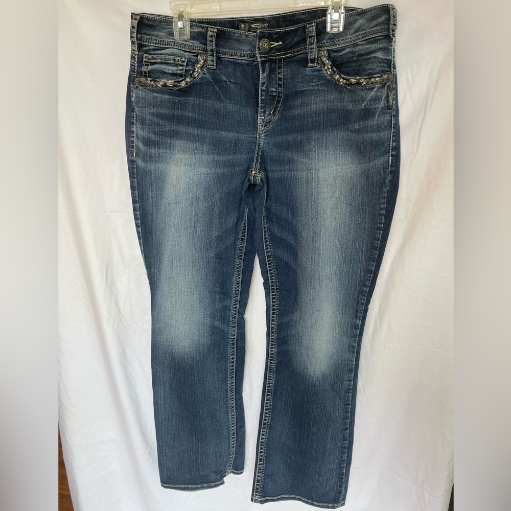 Distressed Slim Bootcut Jeans with Embroidered Details